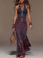 Lavinia | Abito maxi a sirena con scollo halter, pizzo e stampa floreale