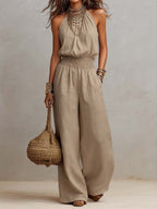 Amelia | Tuta Halter con Gamba Ampia