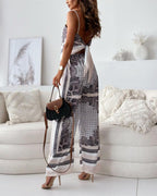 Helen | Set di due pezzi elegante con top a lacci e pantaloni pronti per le vacanze
